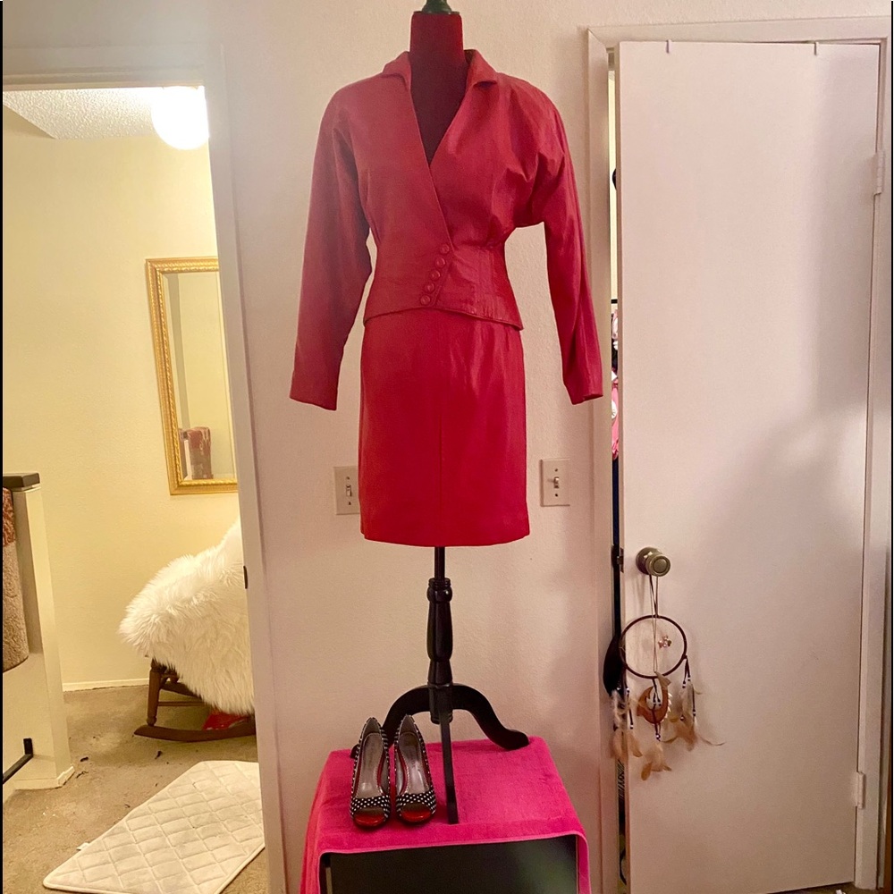 Leather jacket with matching skirt, worn twice.